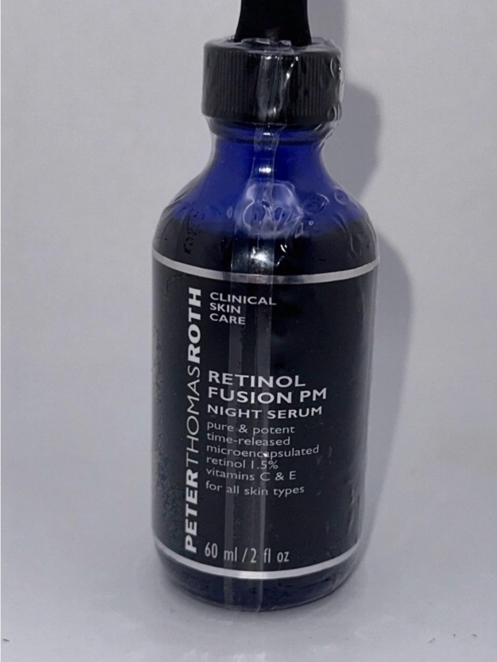 Peter Thomas Roth Retinol Fusion PM Night Serum - Blue and Black Bottle